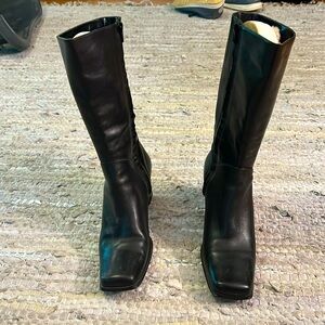 Tall black women’s boots. Never worn. Leather